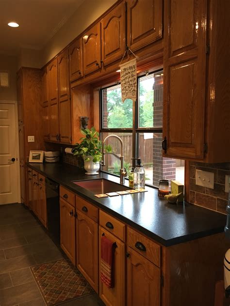 honey kitchen cabinets with stainless steel appliances|modernize honey oak cabinets.